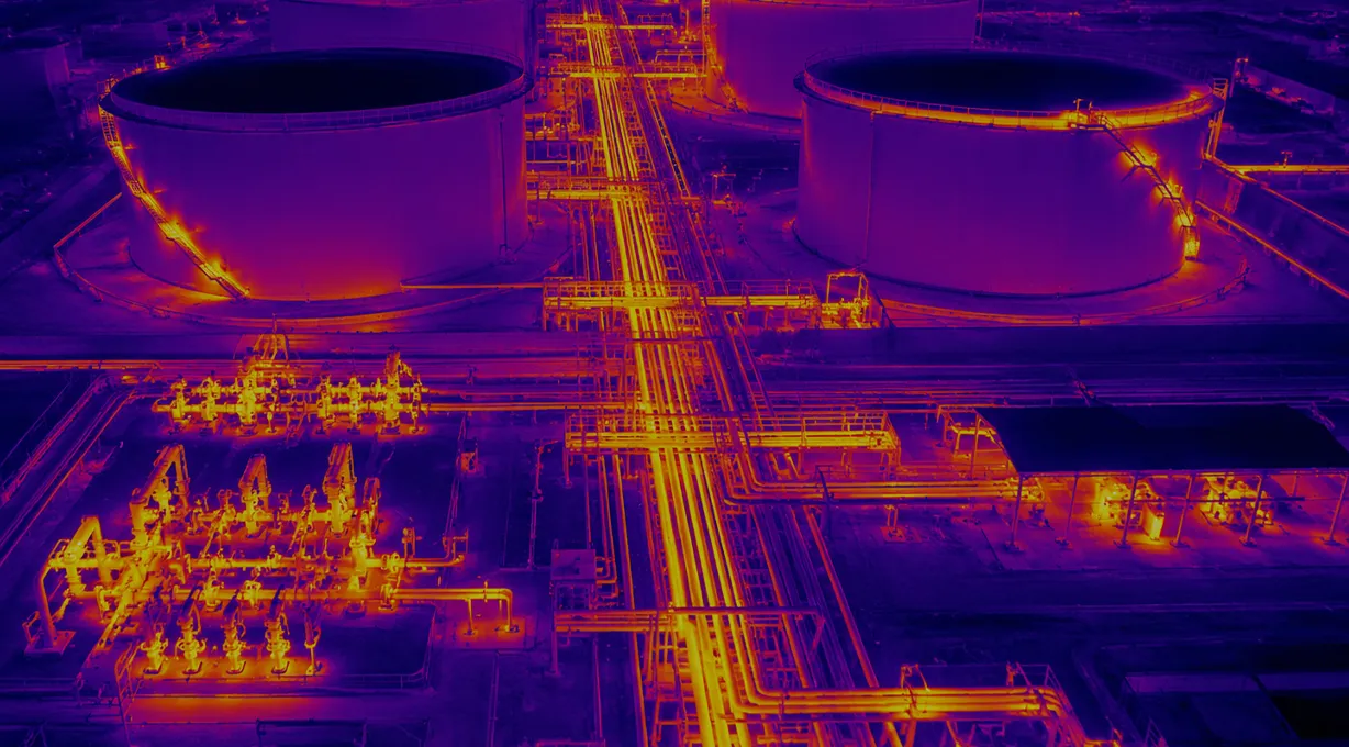 elevated thermal surveillance view showing camera placement for industrial night monitoring